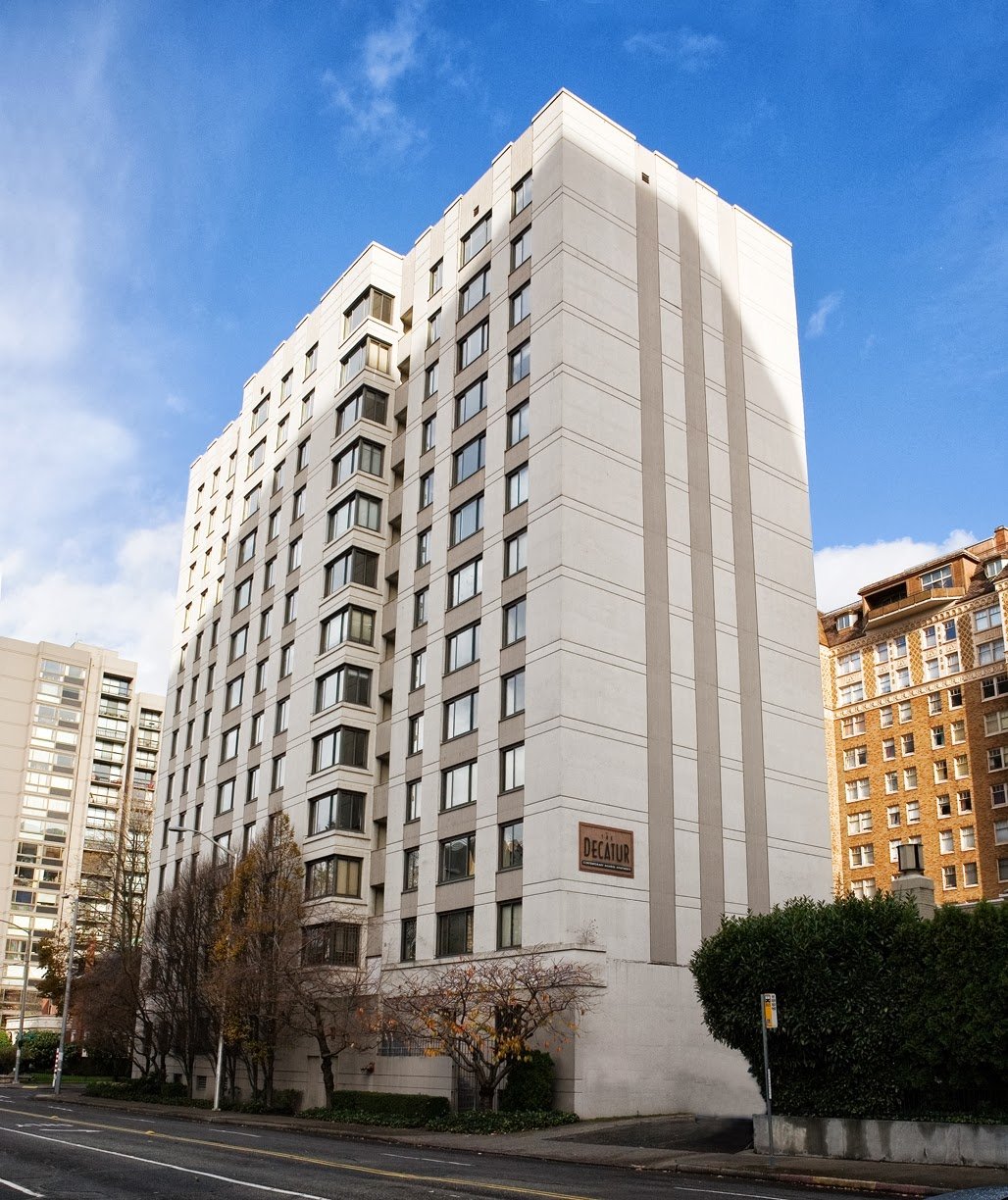The Decatur, a white 12-story residential tower